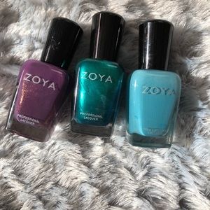 Zoya nail lacquers in 3 different colors
